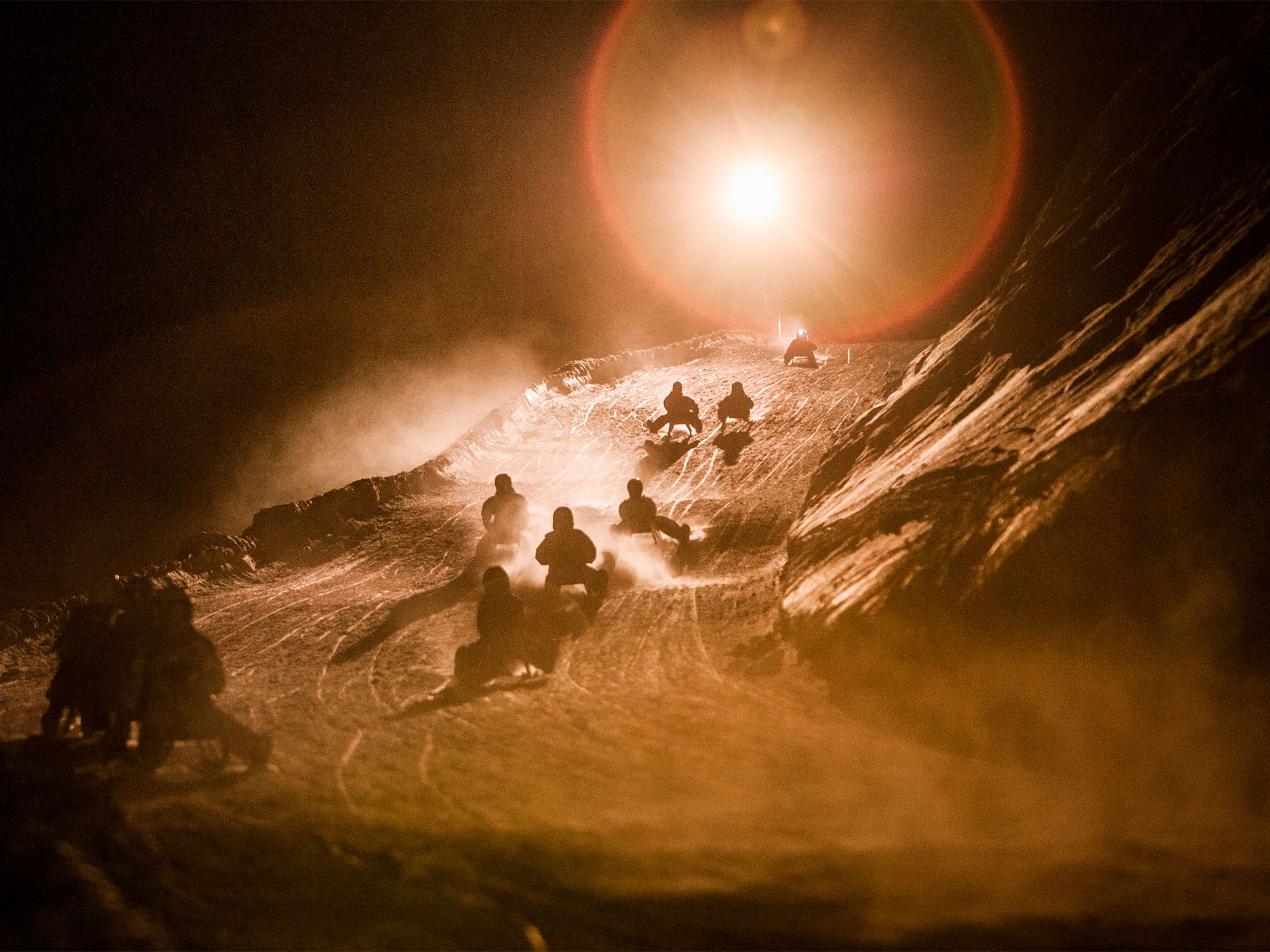 Slittare in notturna 